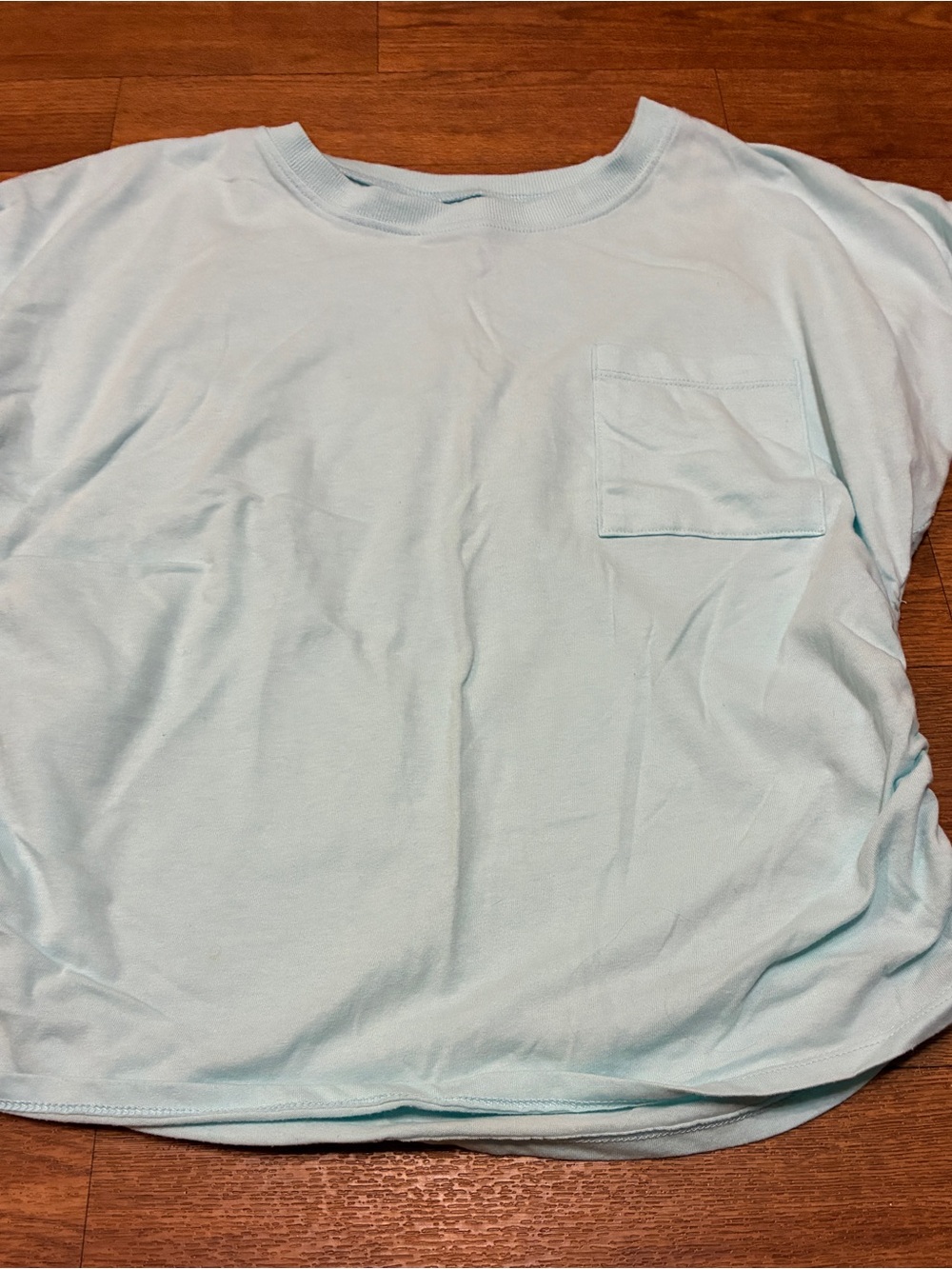 Women’s/Junior’s  Light Blue Pocket Shirt With Cinching On The Sides